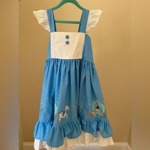 Blue and White Ruffled Dress with Horse and Carriage Design